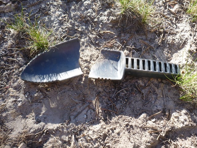 A broken poop shovel.