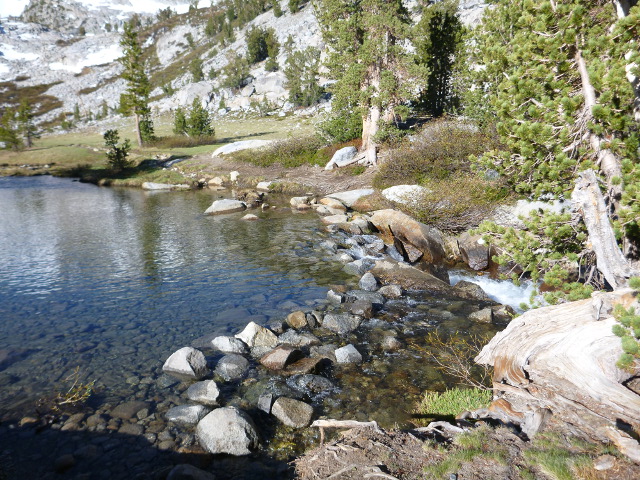 Rocks forming the John Muir trail over  the head of a stream.