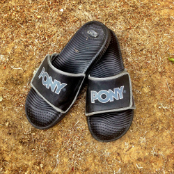 Pony slip-on sandals.