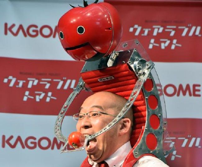 "Eat the tomato!" says Tomatan, the tomato-feeding robot.